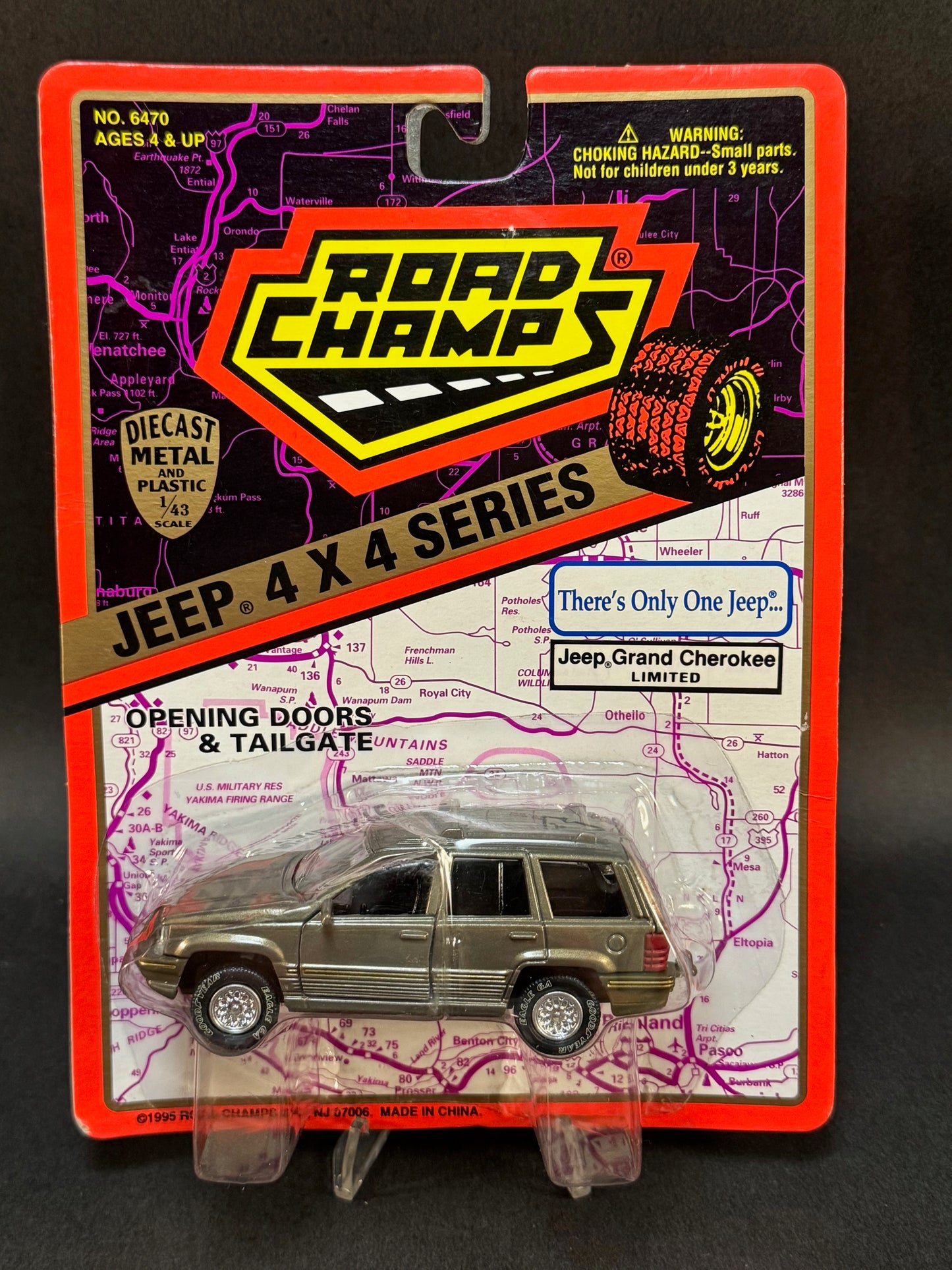 1995 Road Champs Jeep 4x4 Series Jeep Grand Cherokee Limited, Gold