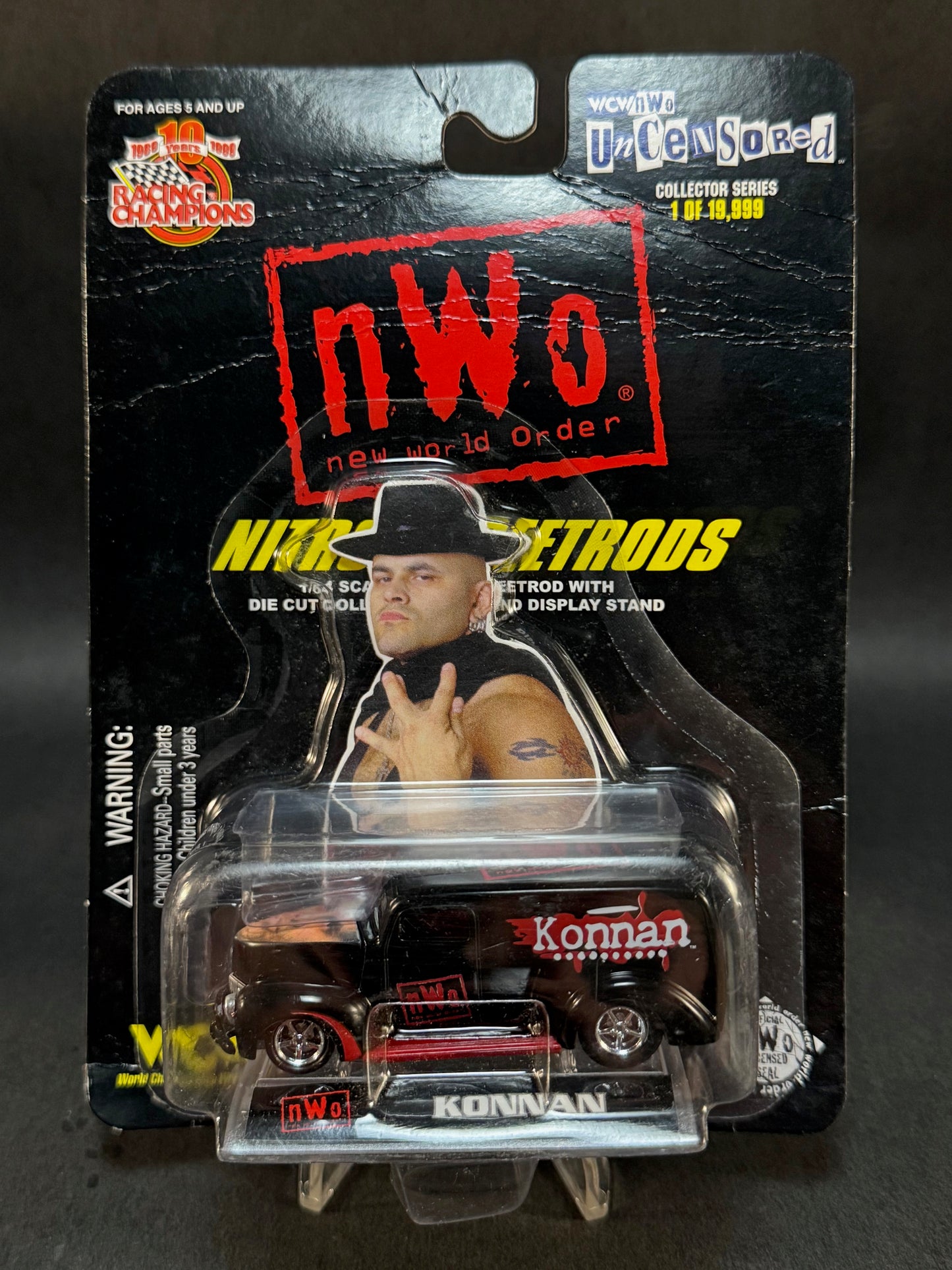 1999 Racing Champions NWO Nitro StreetRods Uncensored Konnan, Black and Red *Creased Card