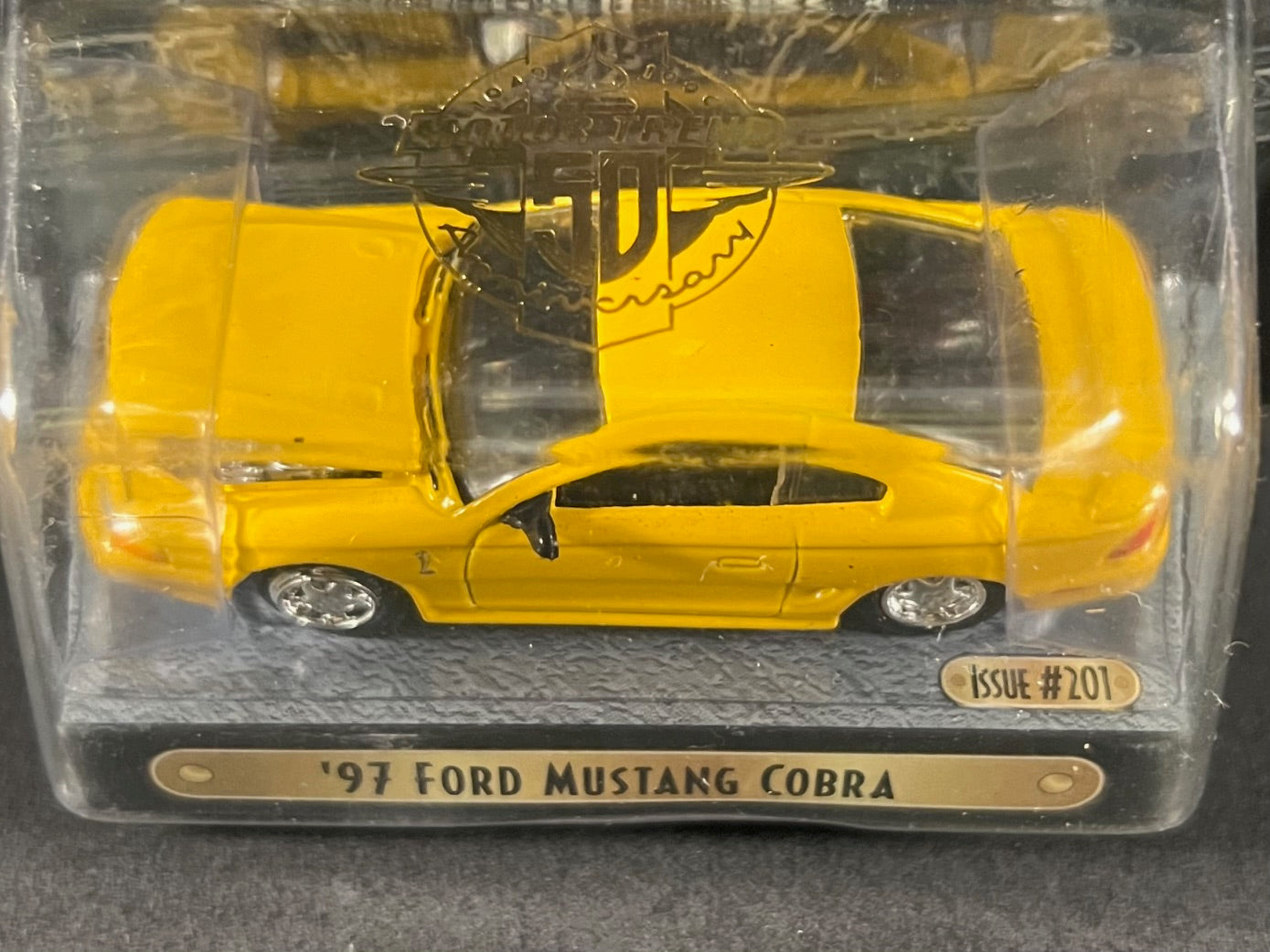 1999 Racing Champions MINT Motor Trend #201 '97 Ford Mustang Cobra, Yellow
