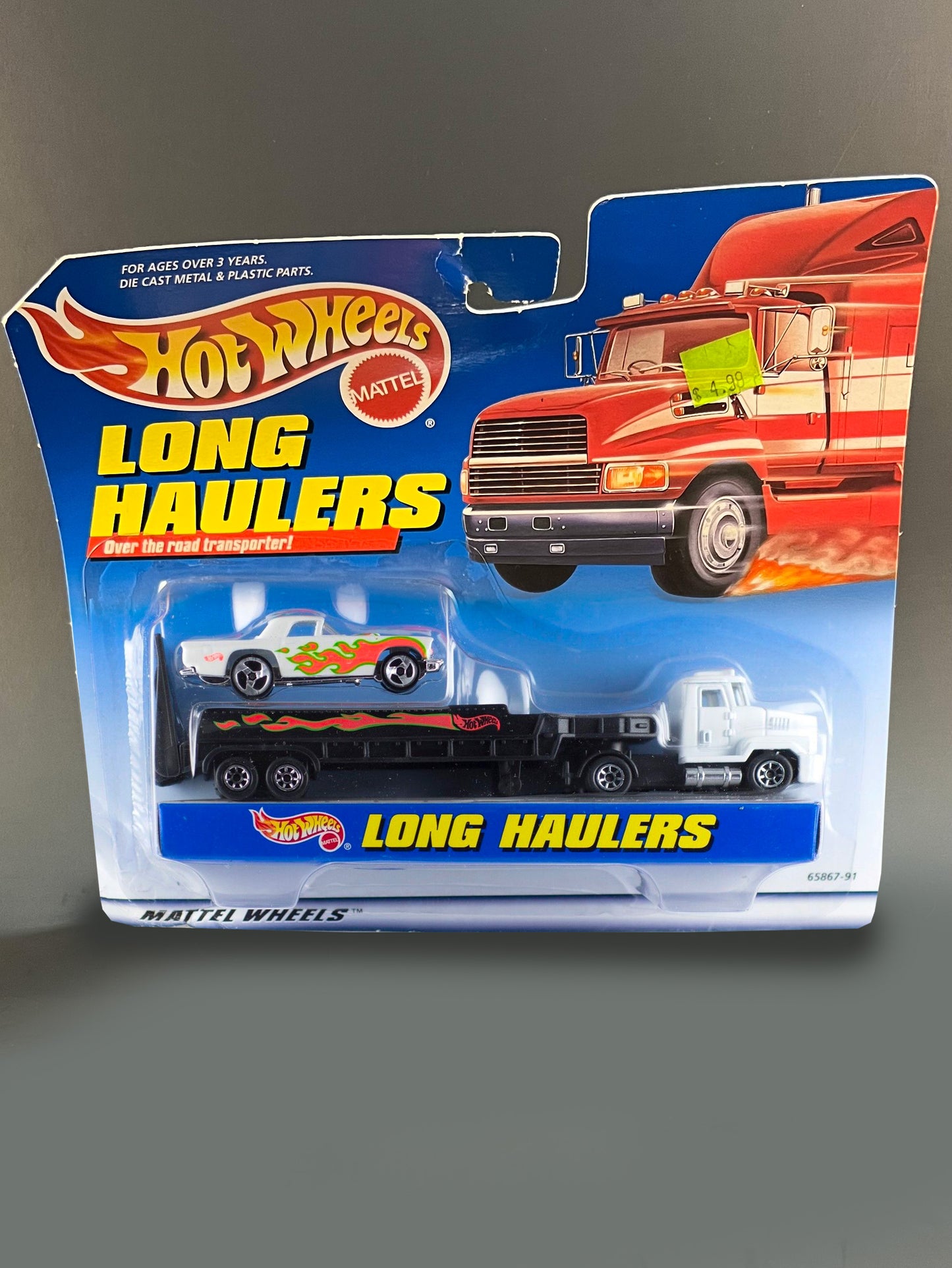 Hot Wheels Long Haulers Semi Truck & Trailer with '57 T-Bird White with Orange Flames