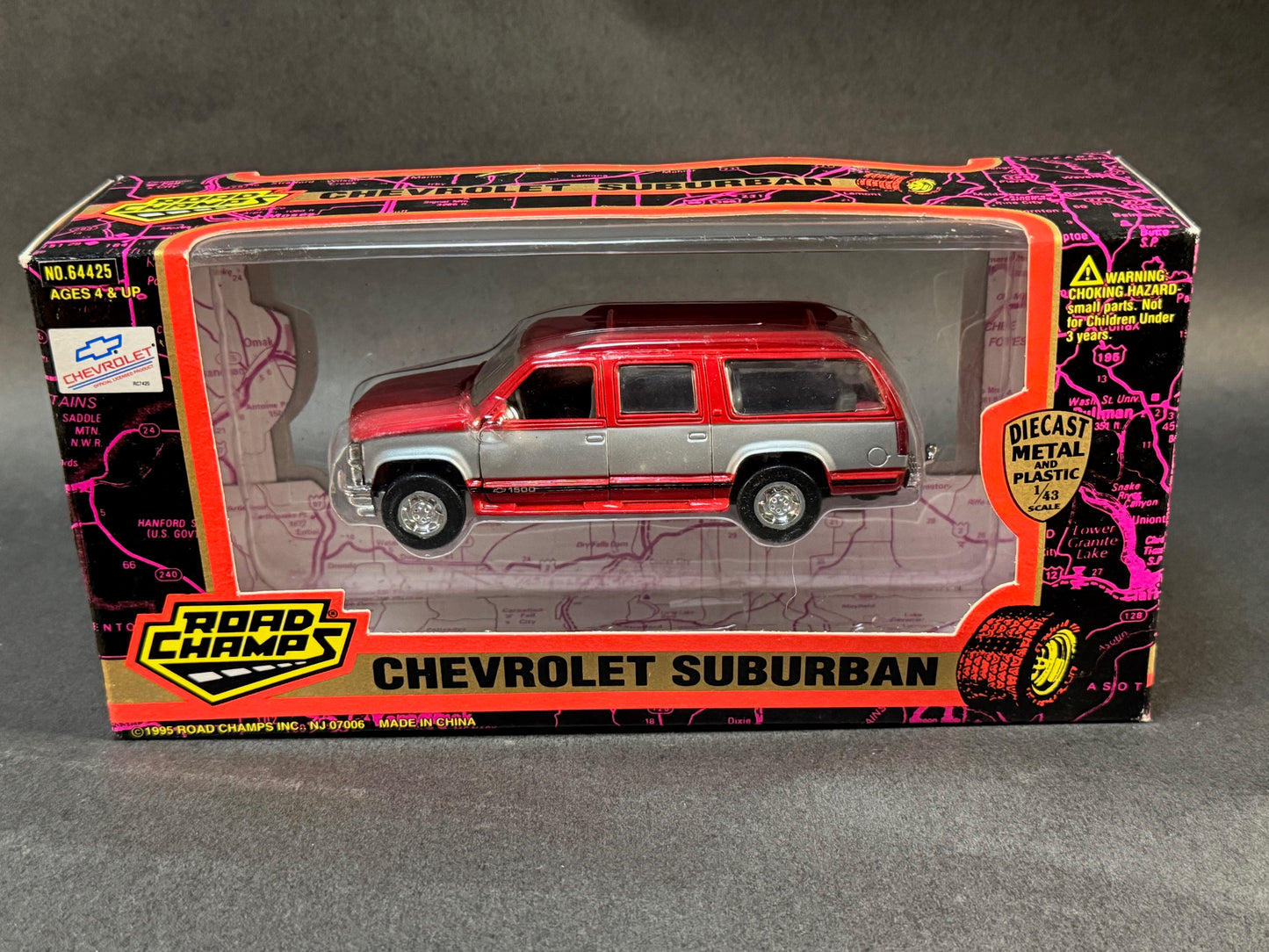 1995 Road Champs Chevrolet Suburban Series Boxed Chevy Suburban 1500, Red and Silver